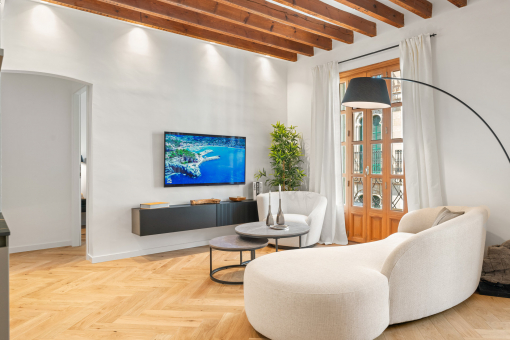 Comfortable living room with balcony access