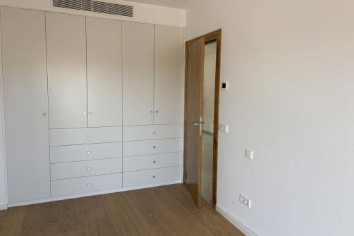 Custom-built wardrobes – fitted with premium parquet flooring