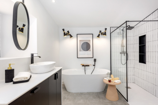 Bathroom with freestanding tub and walk-in shower in elegant style