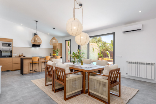 Kitchen and modern and cosy dining area