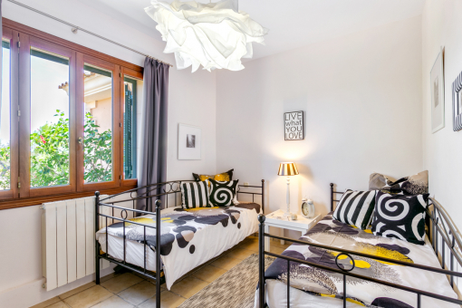 One of 4 bright bedrooms