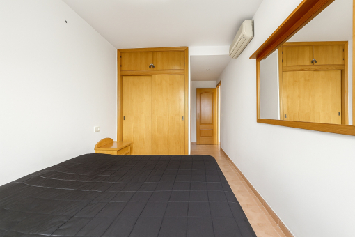 Master bedroom with built-in wardrobe