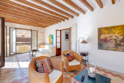 Bright living room with original ceiling beams