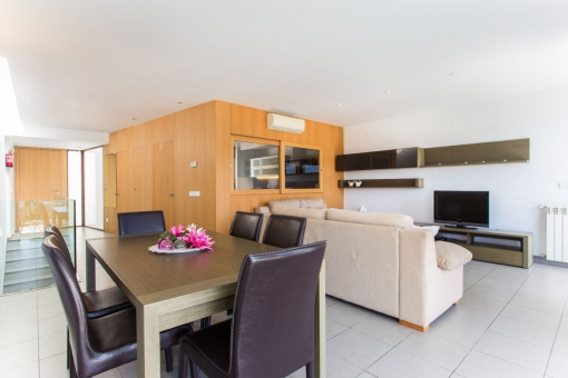 Open living and dining area and separated kitchen