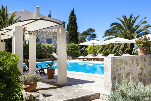 Inviting pool area with sun loungers