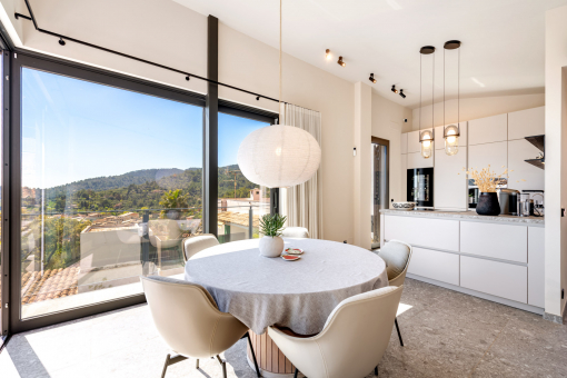 Modern kitchen and dining area on the upper floor