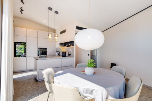 Dining area with panoramic windows and views