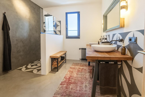 Modern bathroom with double sink and shower