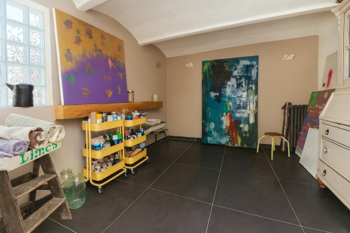 Art studio with storage cabinet