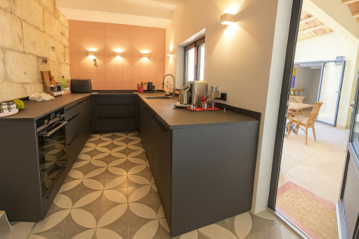 Modern indoor kitchen with outdoor access