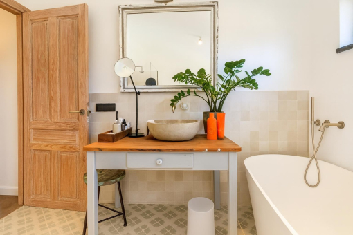 Rustic bathroom with bathtub and sink
