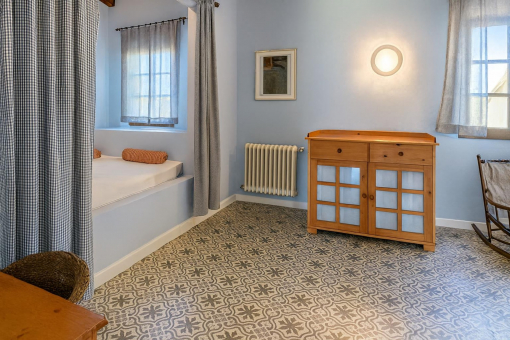 Cozy ground floor bedroom with sitting area