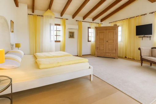 Bright spacious master bedroom interior