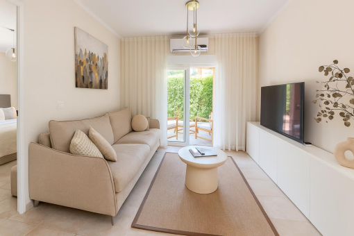 05_living_room_access_terrace_bedroom_ground_floor_apartment_holiday_license_canyamel_Apartment_Canyamel