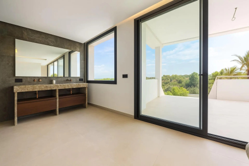 Main bathroom with direct terrace access