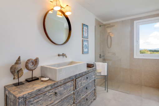 Bathroom with amplious shower
