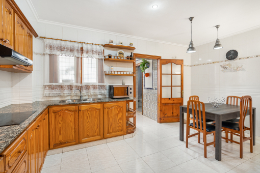 Adjoining kitchen with dining area