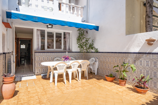 Sunny terrace with awning