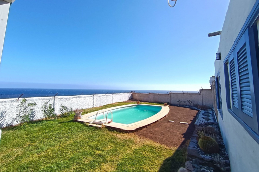Pool area with sea views