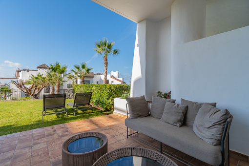 Covered terrace with cosy seating