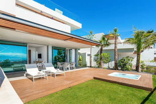 Luxury apartment with spacious terrace and garden in the exclusive Abama Golf Resort