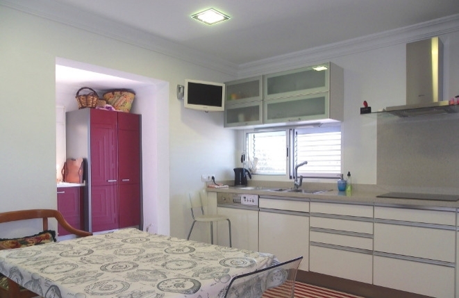 Spacious fully equipped kitchen with laundry