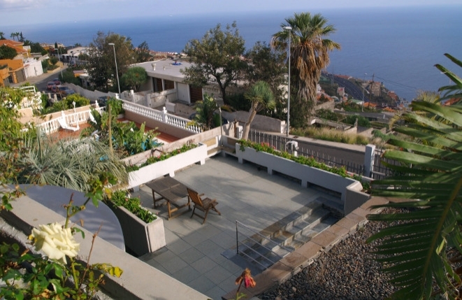 View to the spacious terrace and the sea
