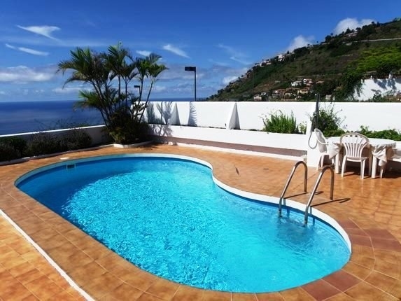 Beautiful panoramic view from the swimming pool to the mountains and sea