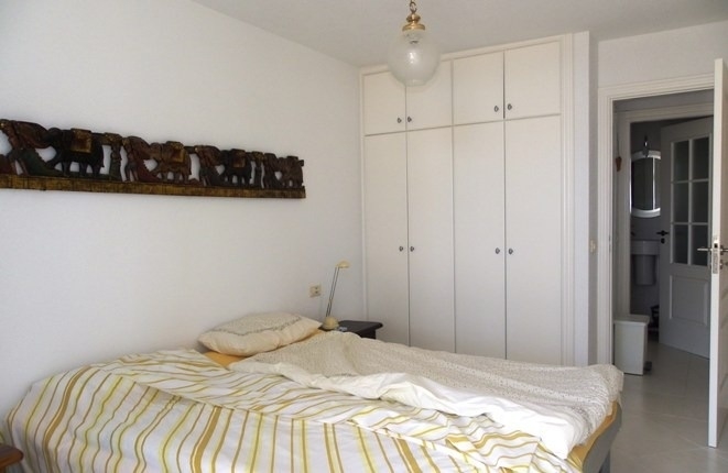 Bedroom with fitted wardrobe and en-suite bathroom 