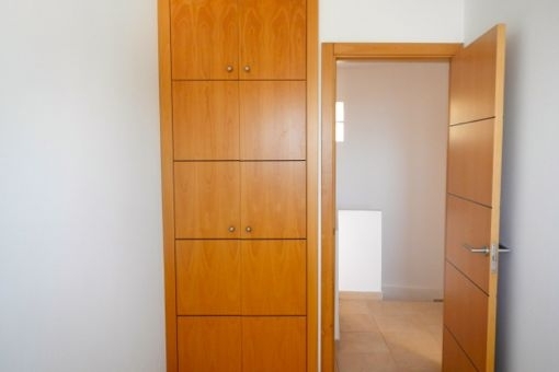 Second bedroom and attached built-in cupboard
