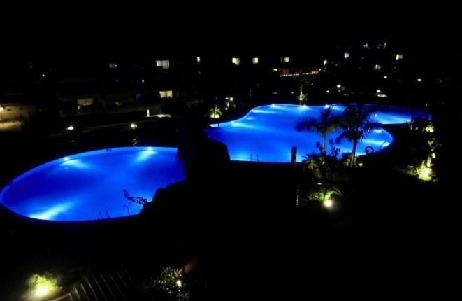 The beautiful pool area at night