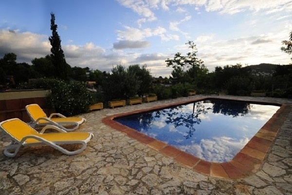 The spacious, paradise-like pool on the beautiful terrace