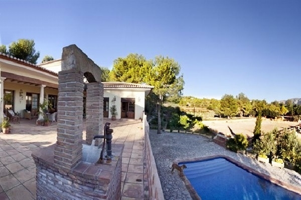 The spacious, paradise-like pool on the beautiful terrace