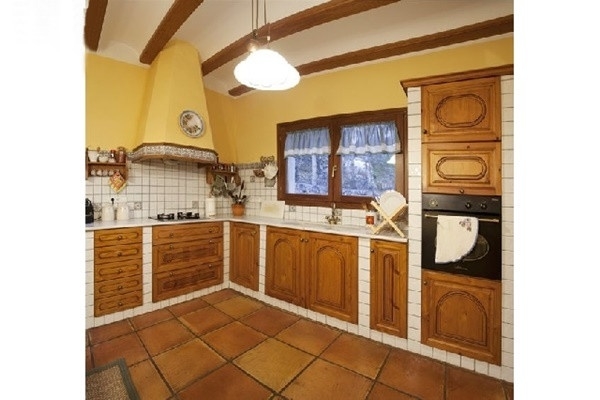 The spacious, light-flooded kitchen