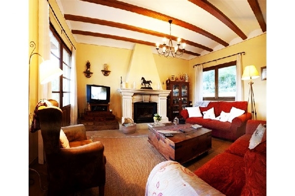 The exquisite living room with chimney and beautiful interior