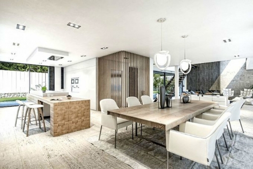 Spacious dining area with bordering kitchen